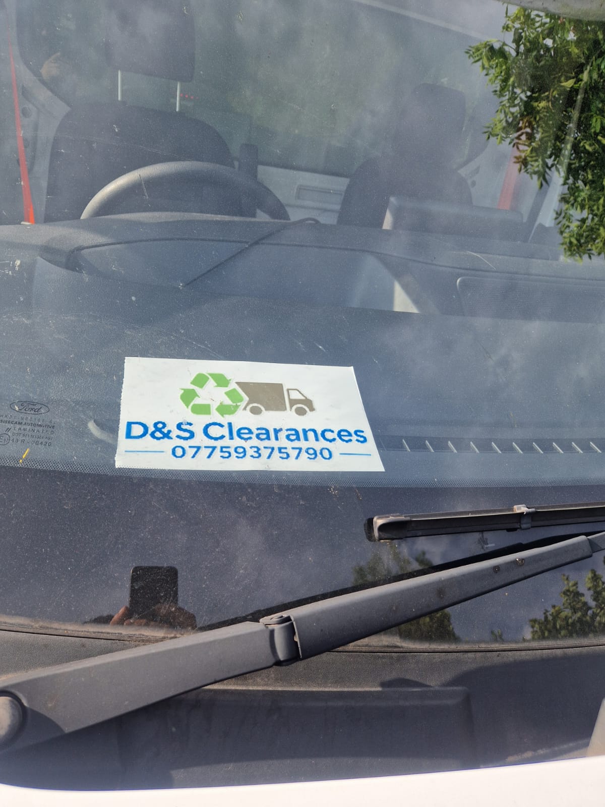 D&S House & Rubbish Removals walking a customer through a house clearance in Penzance